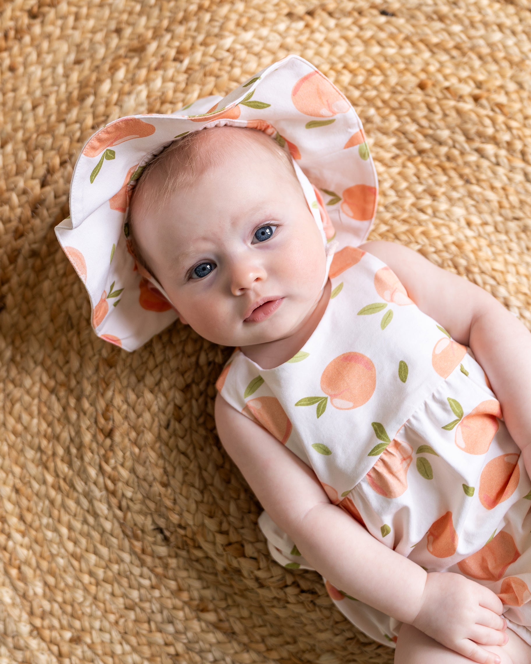 Peaches Cross Strap Ruffle Baby Romper + Sunhat (Organic Jersey)